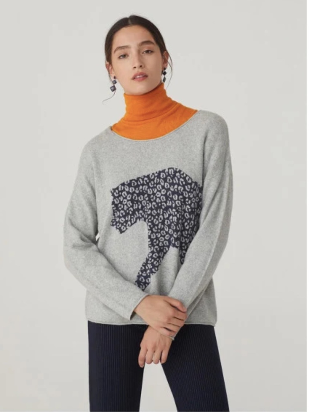 Charlie women’s Grey Long-Sleeve Sweater with Leopard Graphic runs front & back
